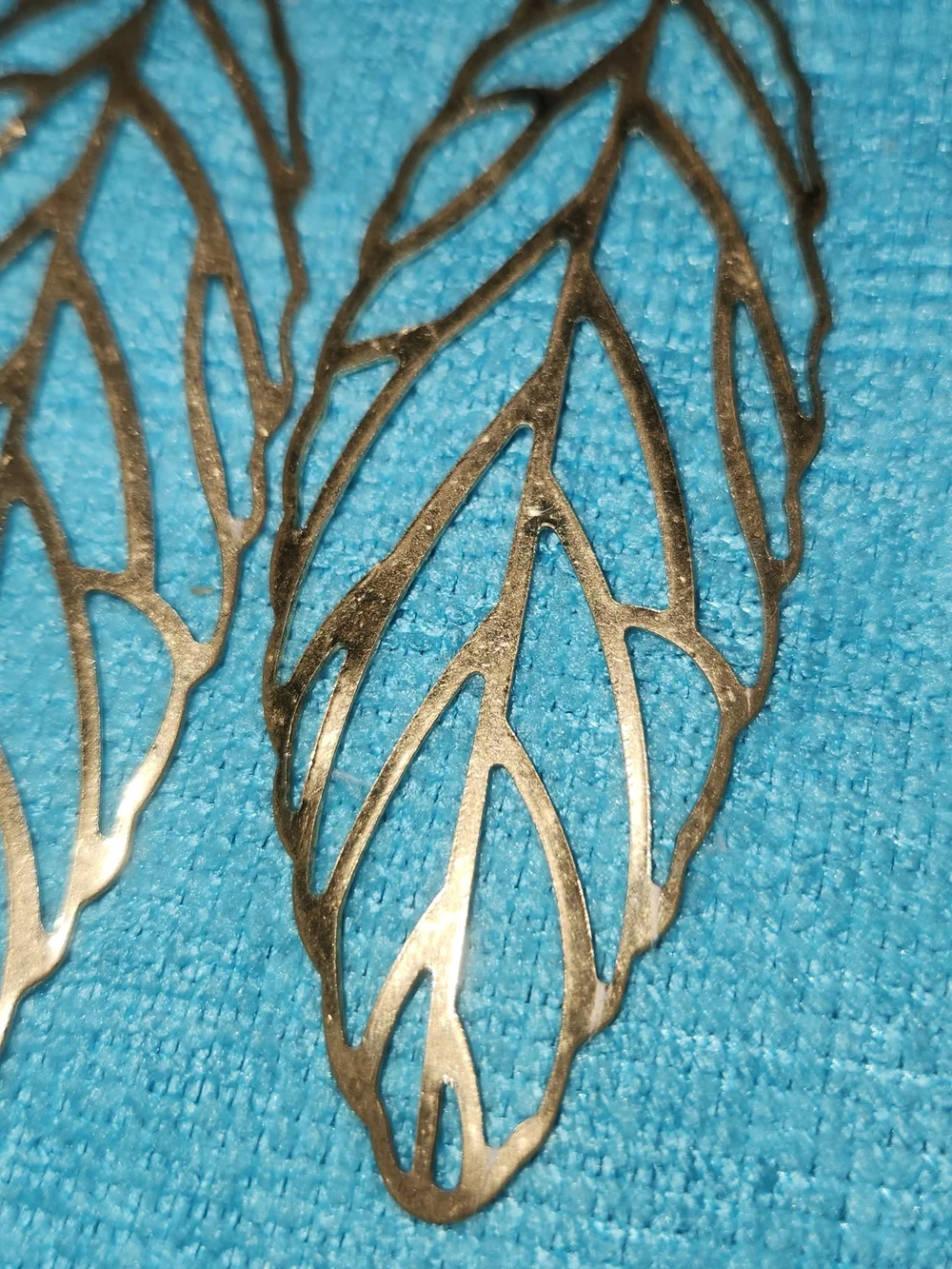 Delicate Cutout Leaf Dangle Earrings — Metallic Bronze